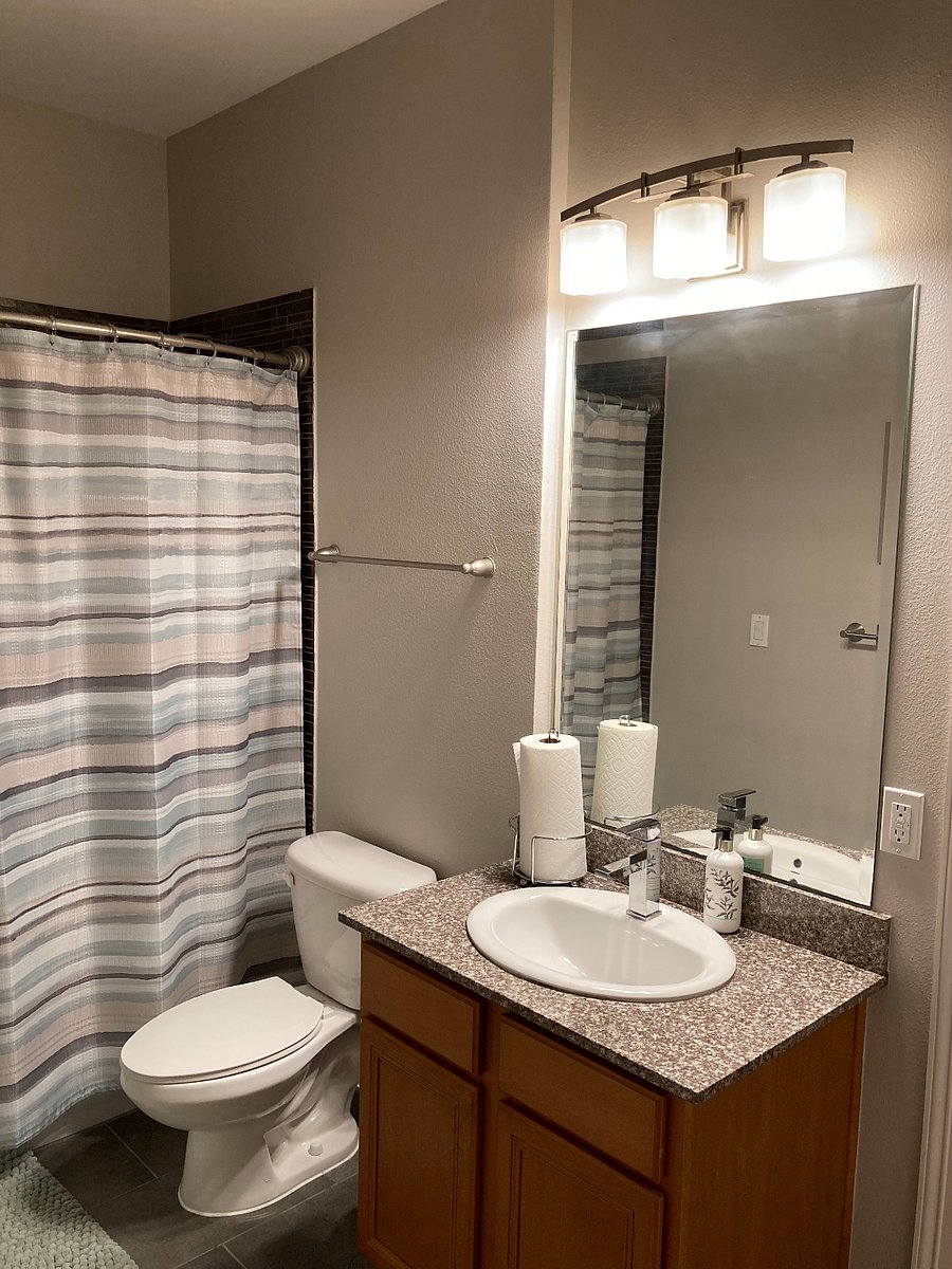 Spacious 2nd full bathroom. This Jack-n-Jill bath is shared by bedrooms 1 and 2.