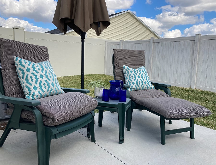 Bask in the sun in total privacy of the enclosed back patio - with gas grill and lounge chairs