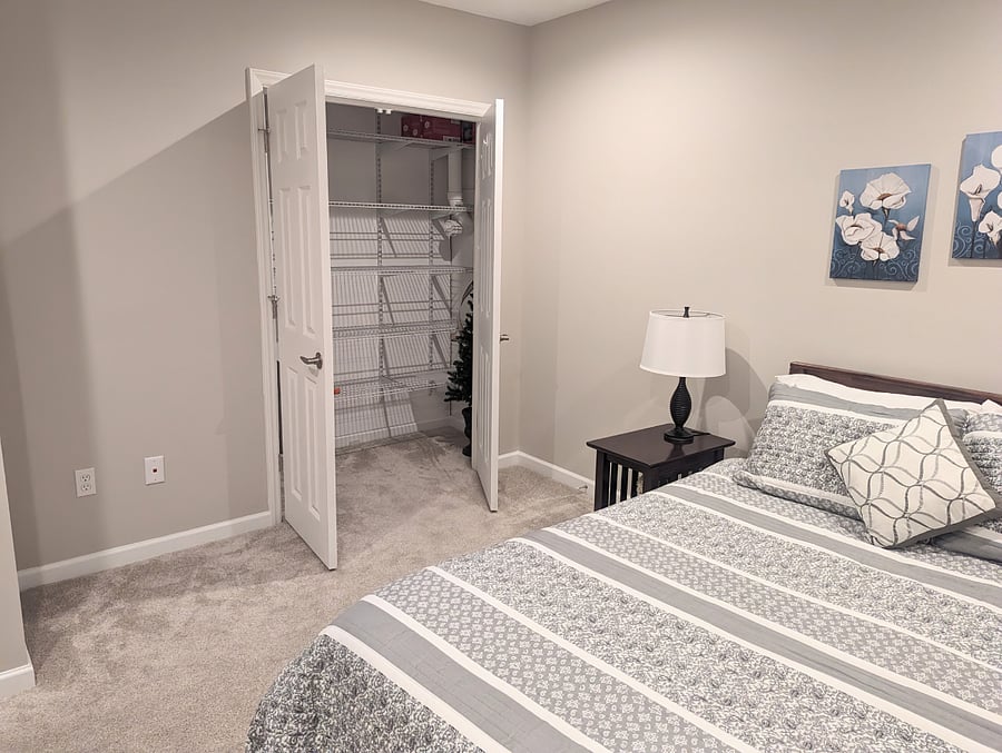 Full sized bed.  Closet has ample storage.