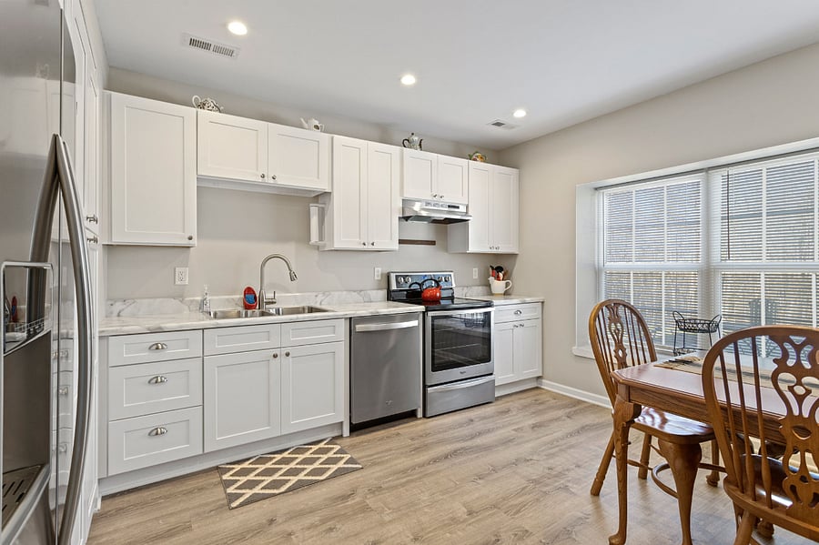 Kitchen windows overlook the patio