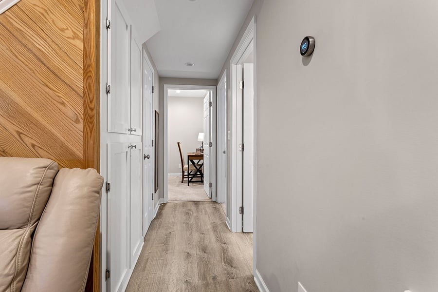 Hallway- bath and king rooms on right. Full room at end of the hallway.