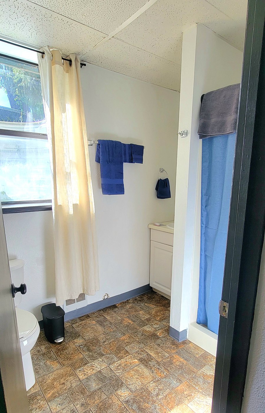 Private bath with shower attached to queen bedroom