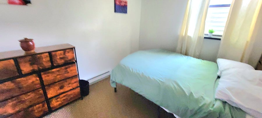 Full bedroom. Big windows, lots of light