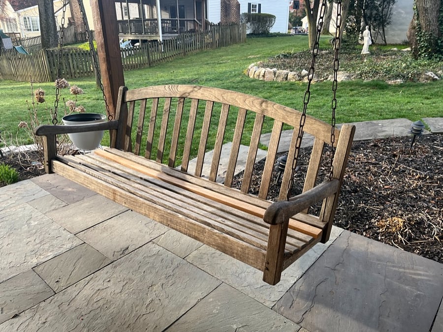 Cushioned Bench Swing on Slate Walkout Patio