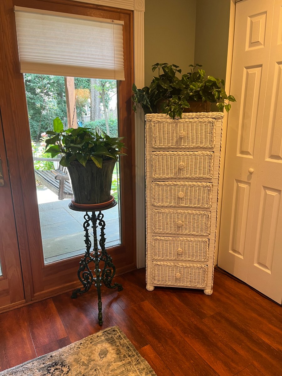 Wicker chest both functional and decorative.