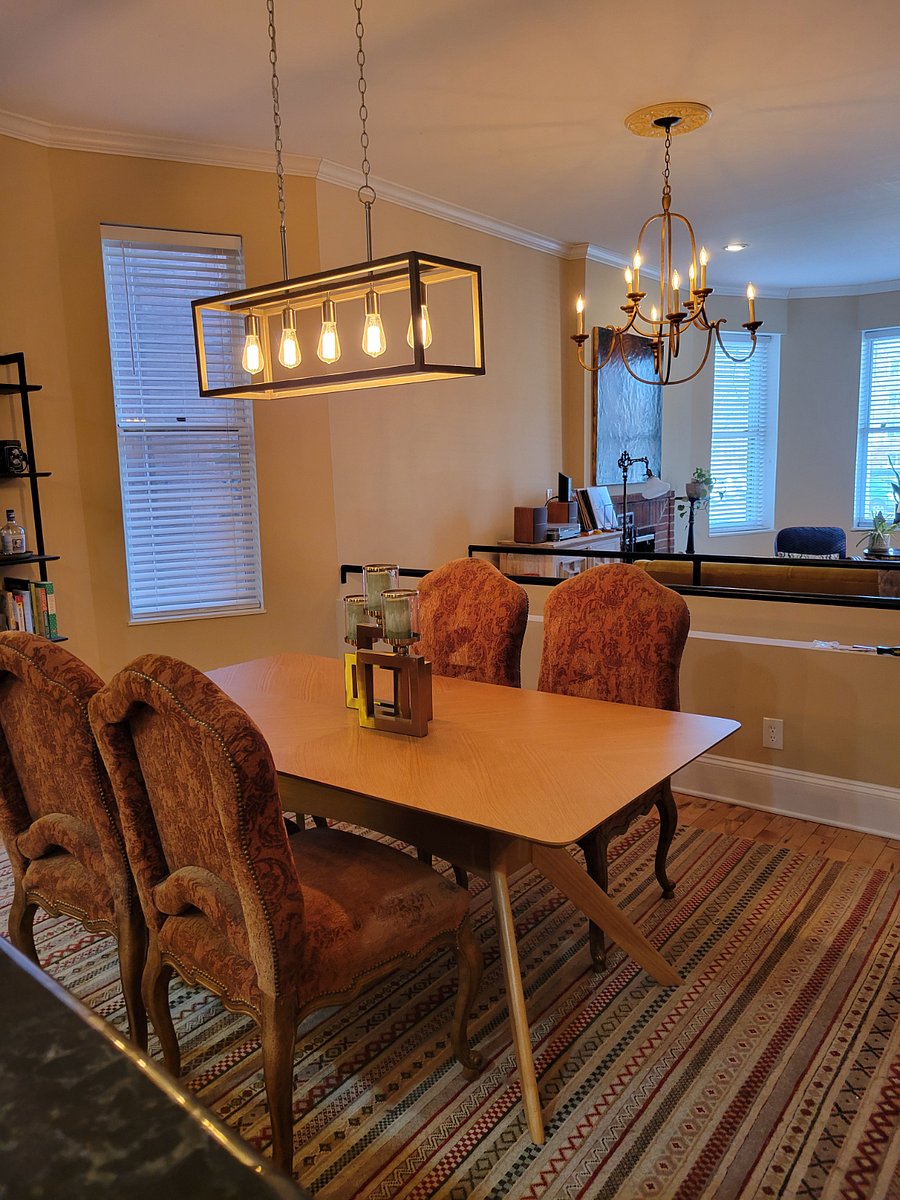 Dining area located between the living room and kitchen