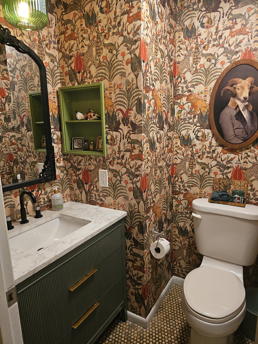 Newly remodeled 1/2 bath with plenty of storage for toiletries