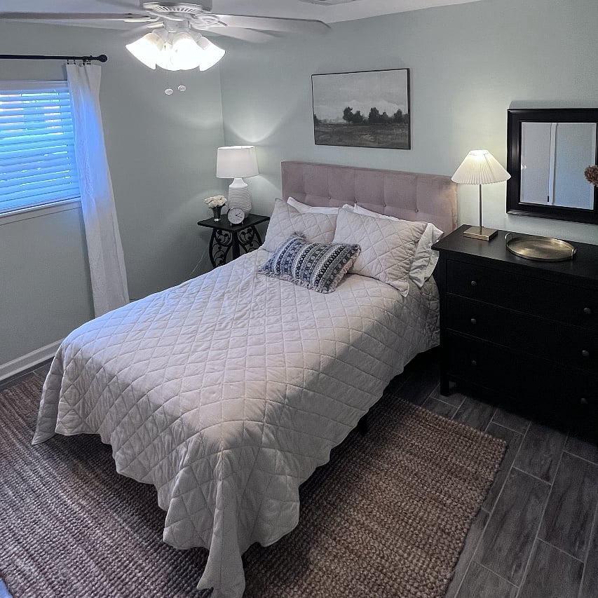 Roomy bedroom with bathroom attached.