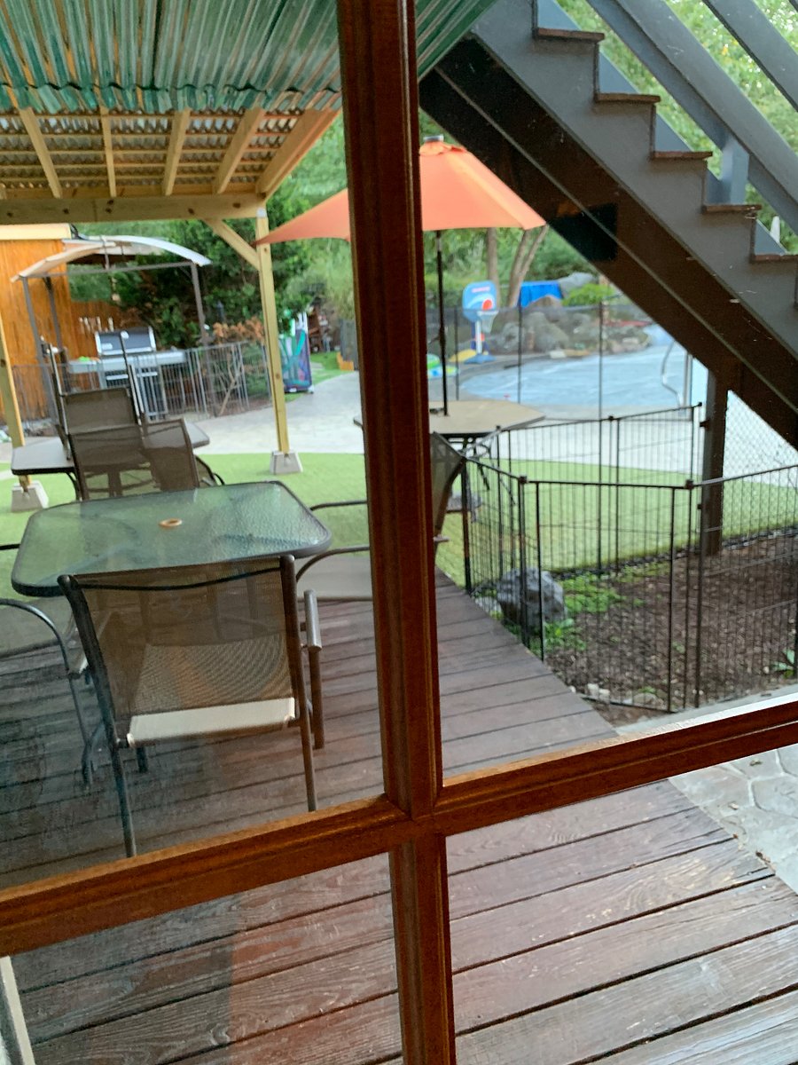 Looking out living room to your private deck and backyard.