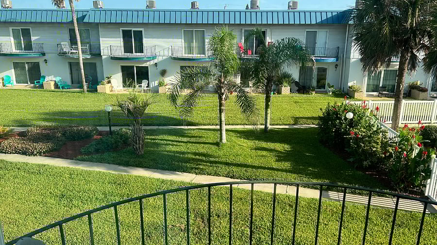 Ocean / pool view from Primary bedroom balcony