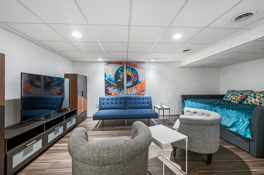 Unwind in our lower level retreat: A cozy haven that whispers relaxation and invites you to stay a little longer.  Queen size day bed with twin bed pullout underneath.