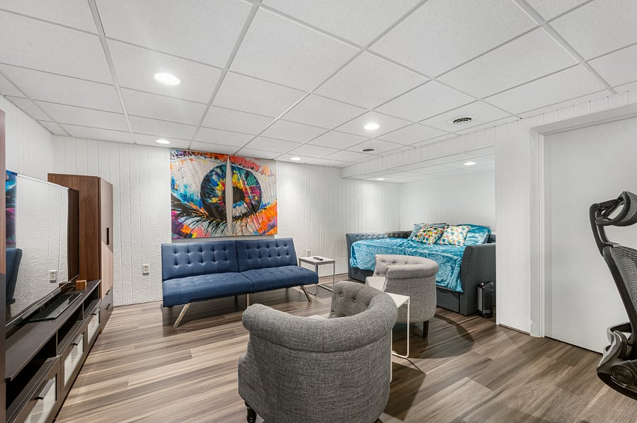 Unwind in our lower level retreat: A cozy haven that whispers relaxation and invites you to stay a little longer.  Queen size day bed with twin bed pullout underneath.