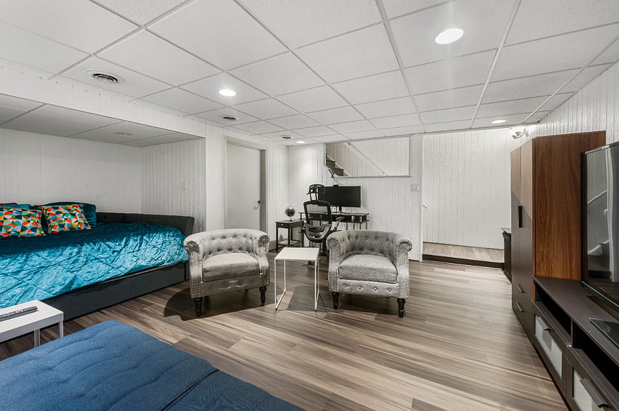 Unwind in our lower level retreat: A cozy haven that whispers relaxation and invites you to stay a little longer.  Queen size day bed with twin bed pullout underneath.