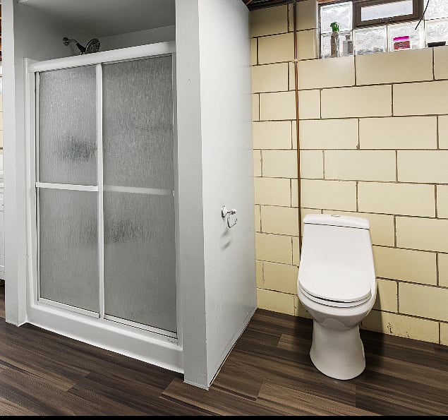 Double the indulgence, double the delight. Our second bathroom is a symphony of style and convenience on the lower level.