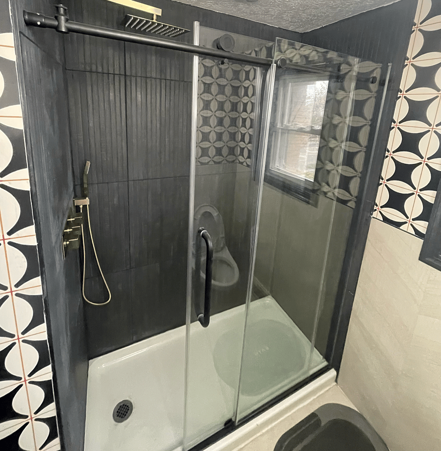 Immerse yourself in the epitome of relaxation. Our modern rain shower bathroom: where luxury meets the soothing rhythm of a gentle downpour.