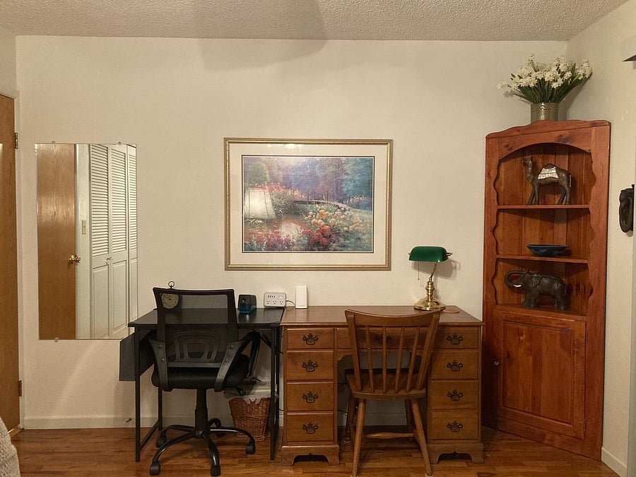 Office desk and table with both an office and wooden chair
