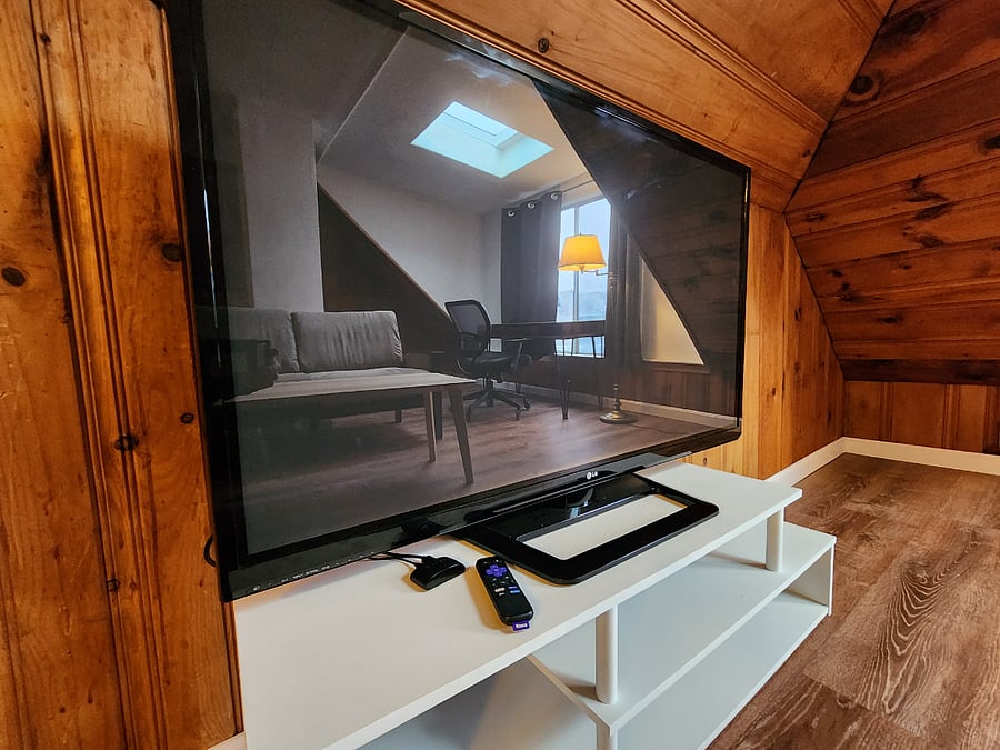 Watch your shows and movies on this 55 inch TV with Roku streaming device