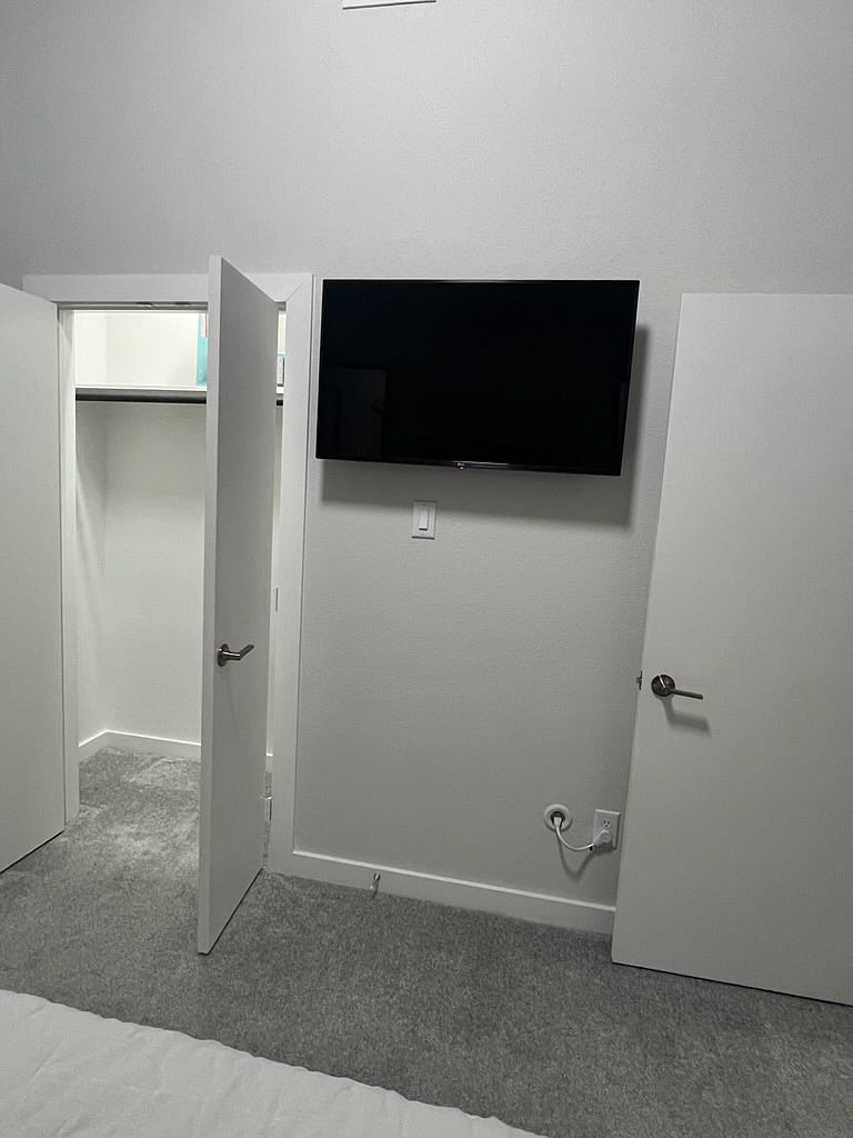 Second bedroom closet space and smart TV