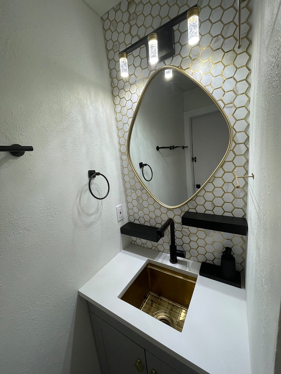 Vanity. Deep sink to wash dishes, no garbage disposal.