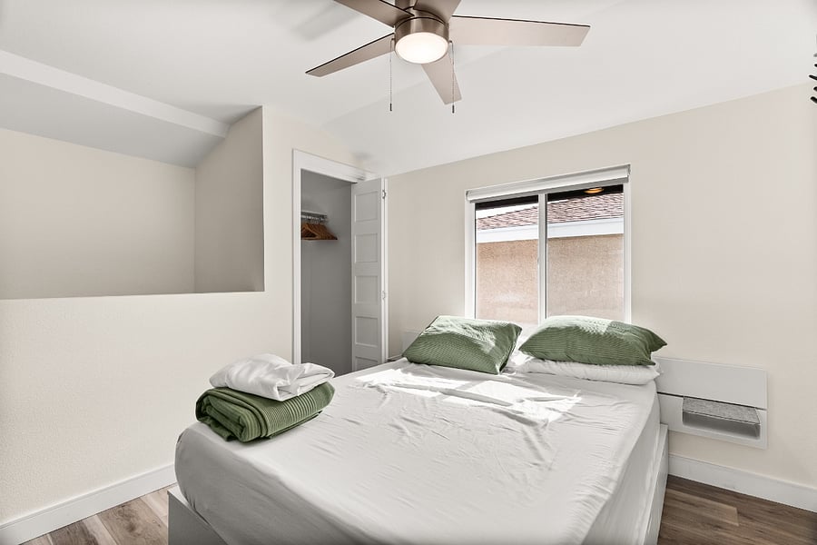 view of sleeping area and walk-in closet.