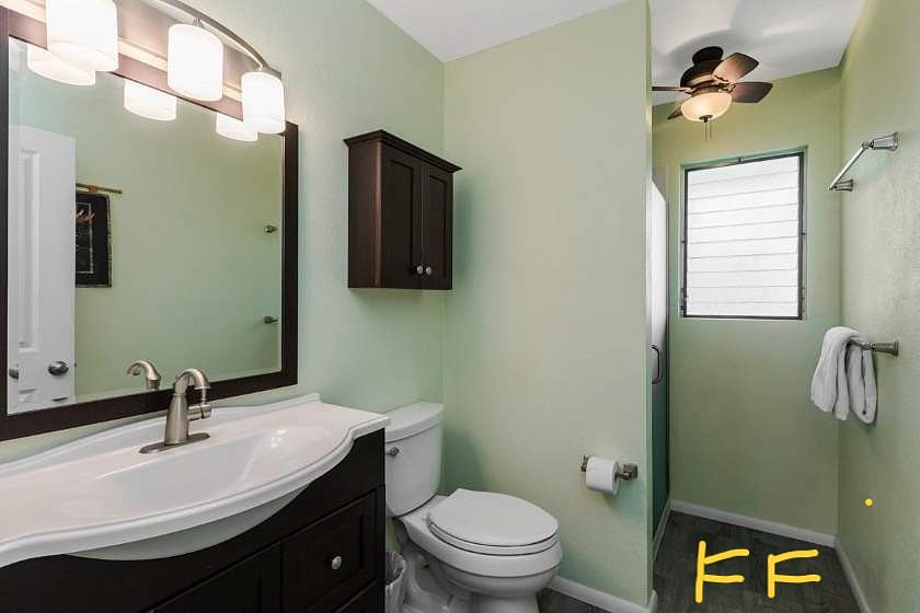 Guest bathroom with shower.