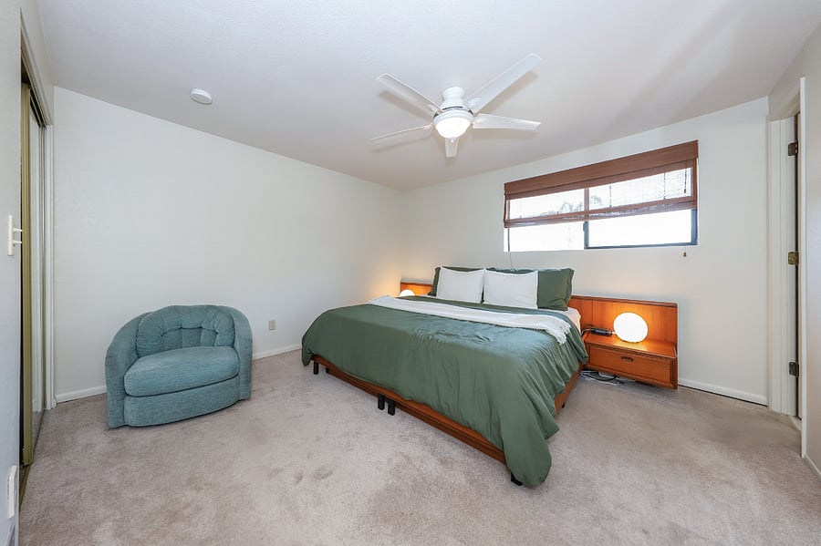 Primary bedroom with King bed and two full closets
