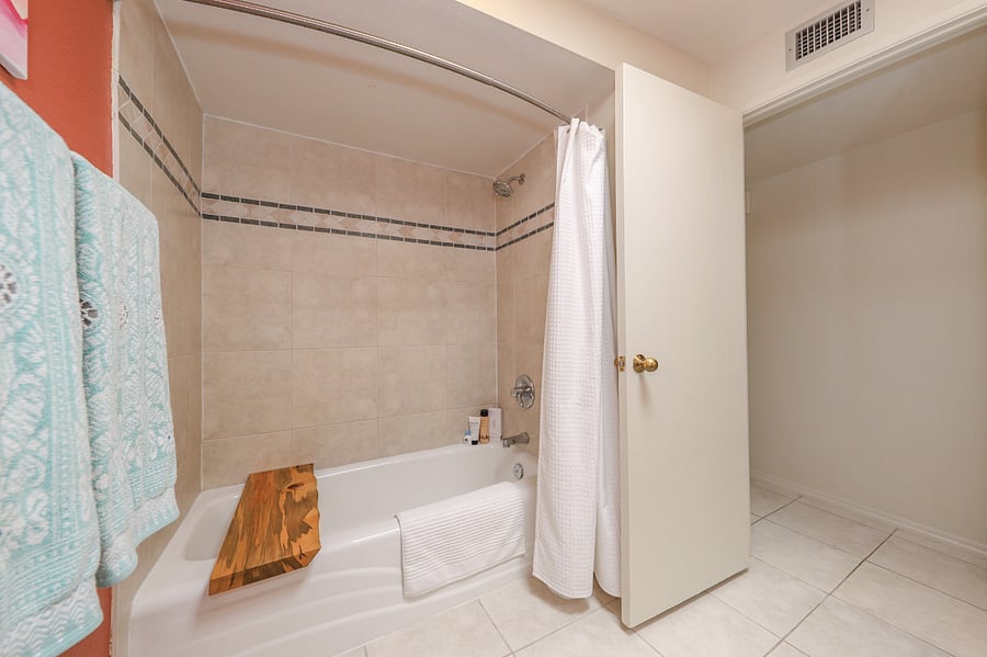 Shared Guest Bathroom - shower and a tub that's great for relaxing