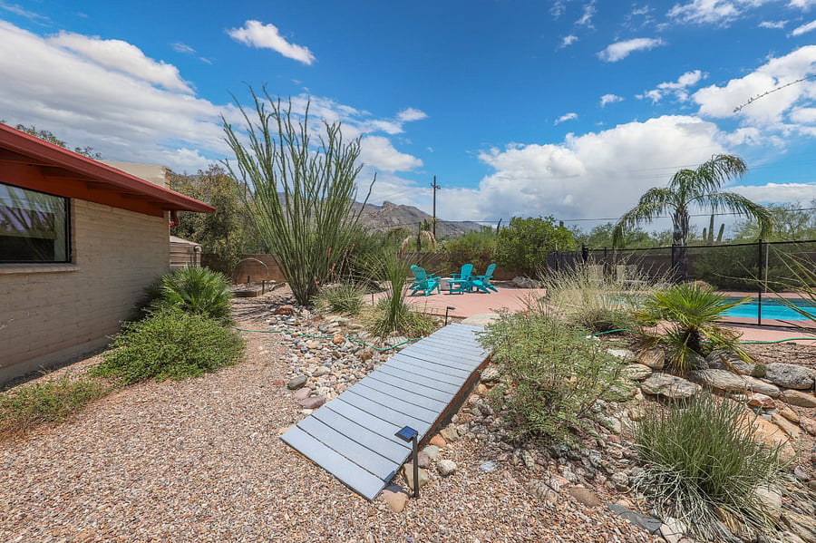 Bridge to pool and firepit areas
