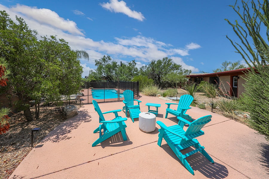 Adirondack chairs & solo stove fire pit with views of the Catalina Mountains