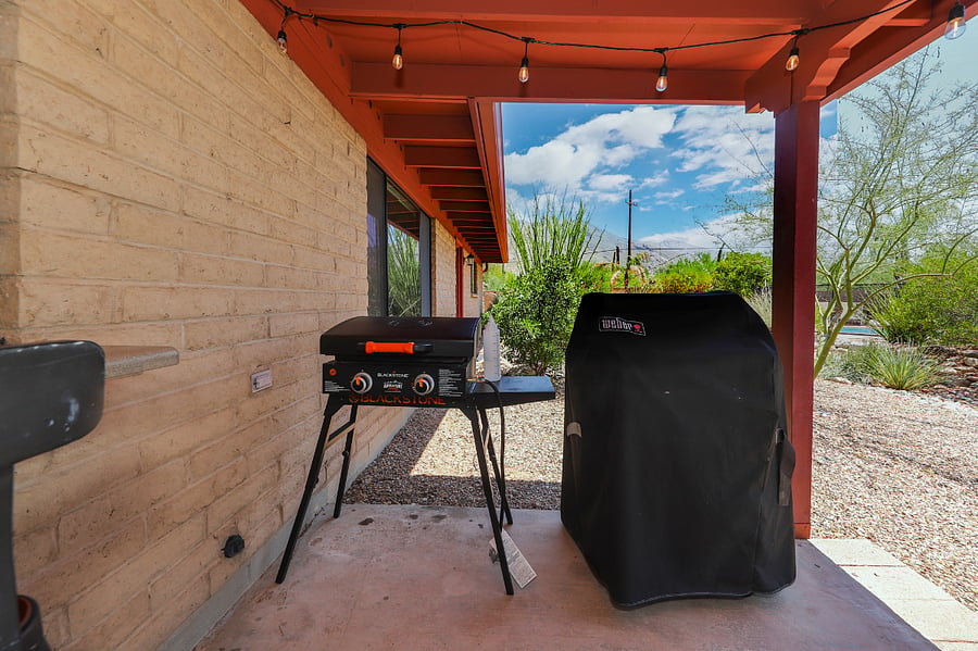 BBQ grill & Blackstone on back patio
