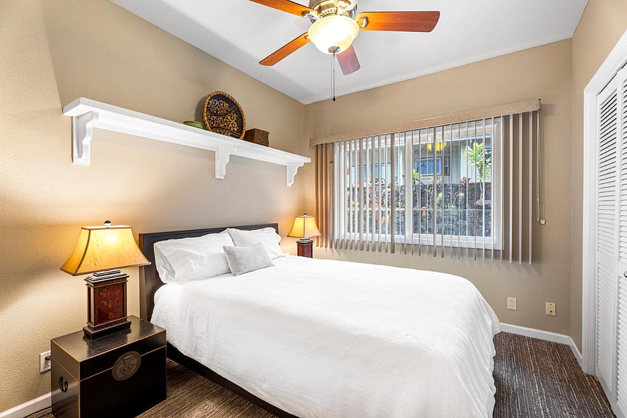 Queen bed in Bed #2 with ceiling fan