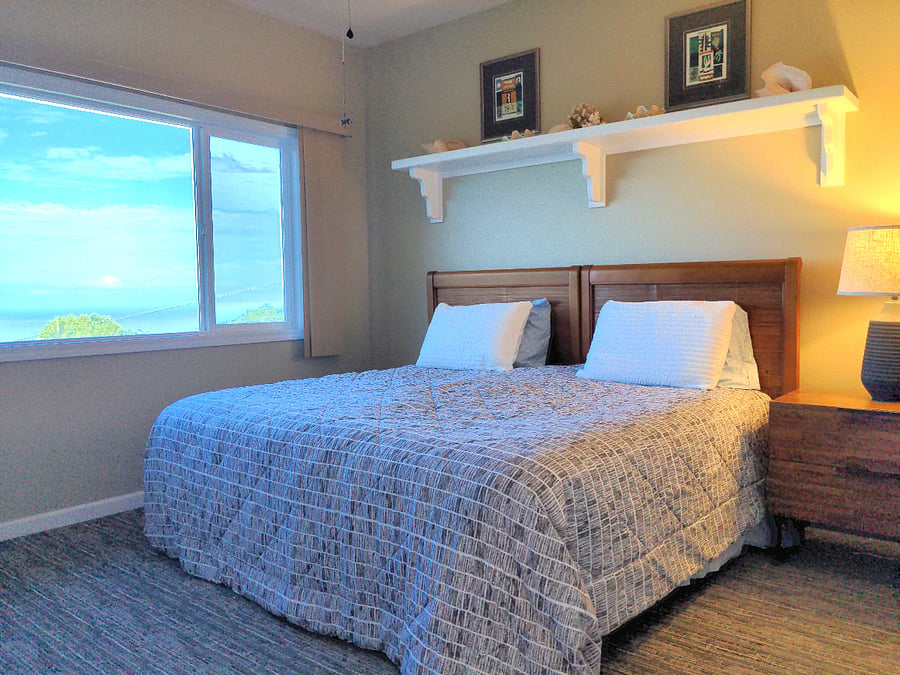 Bedroom #1 has (2) twins together for king size bed. Also has a ceiling fan.