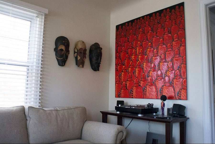 art in living room (But the record player pictured is gone)