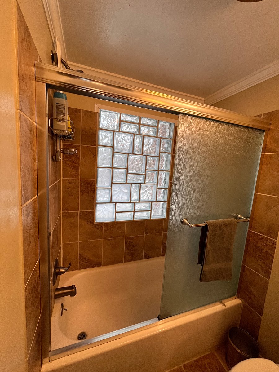 The full bathroom upstairs next to the bedroom.