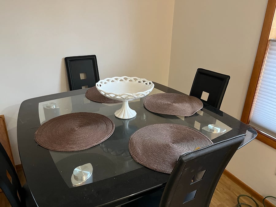 Glass dining room table w/seating for 4