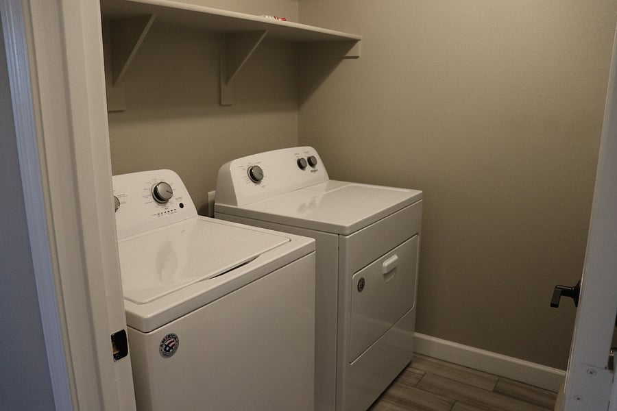 Laundry room, with lots of additional storage space.
