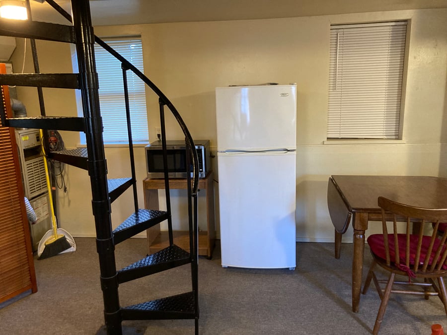 Mircowave and apartment-sized fridge.