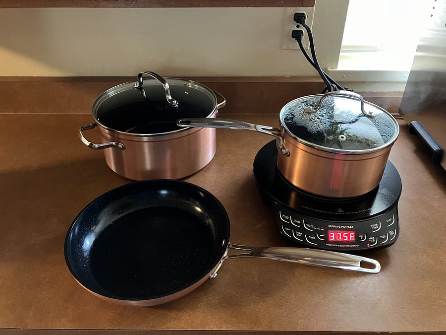 A portable induction cooktop, pots and pans are available (there is no range/oven).