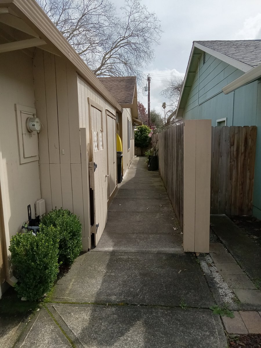 Walkway to rear deck and entry