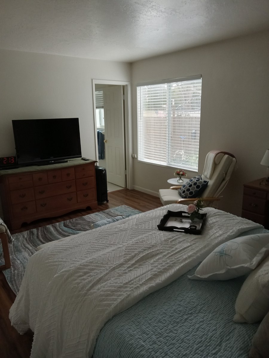 2" white window blinds
Note: black out curtains upon request