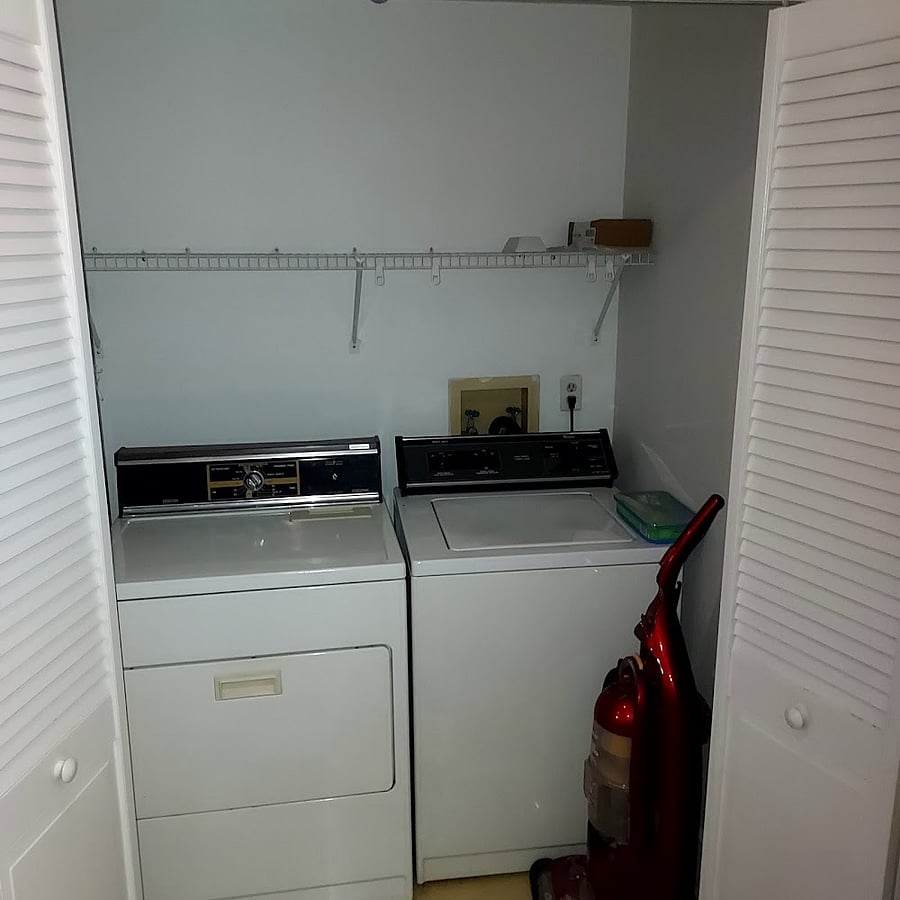 Laundry room at base of stairs (first floor).