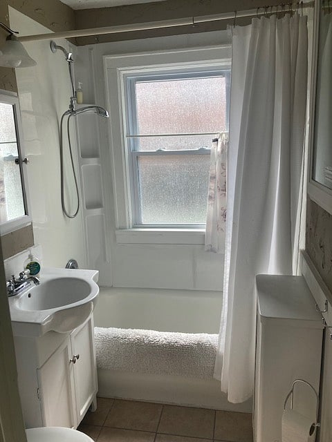 Bathroom with tub and shower.