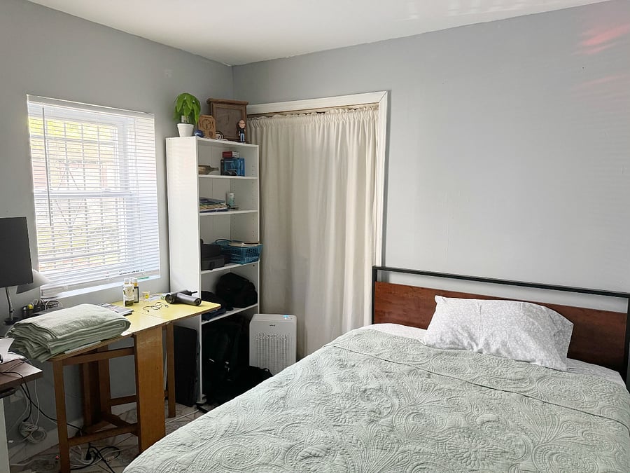 small bedroom. monitor and desk included