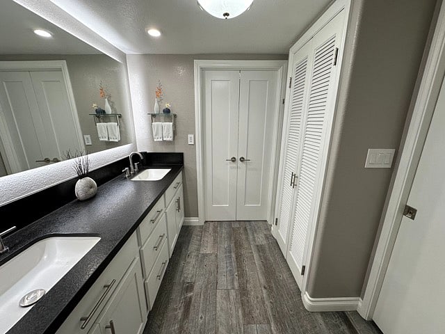 Full size LG washer/dryer in the doors to the right. Shower and toilet through double doors straight ahead.