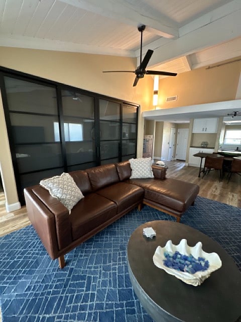 Bedroom with custom shades closed for privacy.