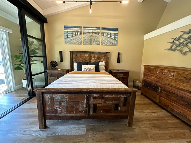 Reclaimed teak bedroom furniture with 2 large nightstands and 9-drawer dresser. Views of the pool and jacuzzi from your bed.