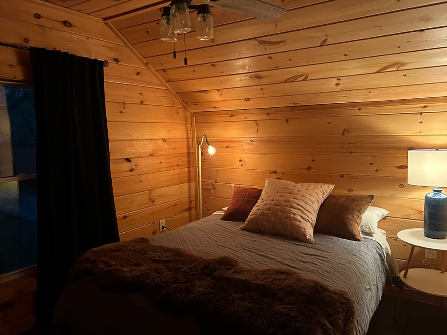 This is the current setup of the bedroom, with new memory-foam mattress, bed frame, linens.