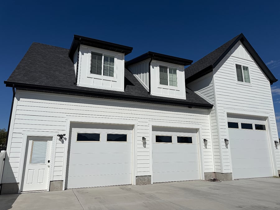 Apartment is above this detached garage behind main house. 1 Parking Spot is allocated in the driveway outside. NO GARAGE space is available. Additional outdoor parking can be accommodated in the back lot located onsite. 