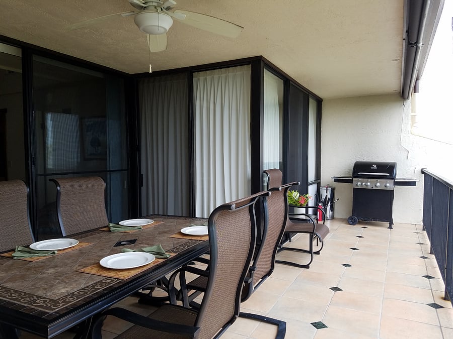 Lanai dining table (NOTE: All BBQs were removed by order of management but are at all 3 pools. (One just steps away)