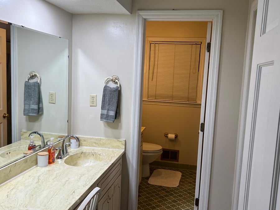 Spacious main bath- large linen closet with vanity sink and long make up area with access to 2nd bath area vanity, toilet, tub and shower.